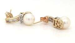 10kt Yellow gold pearl and round brilliant and baguette cut diamond earrings
