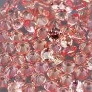 Brilliant 2.55ct diamond cut padparadsha Sapphire set
