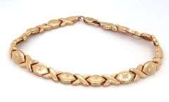 14kt Yellow gold X link bracelet