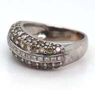 14kt White gold Levian chocolate and white diamond pave wave ring