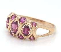 14kt Yellow gold oval and round rhodalite garnet dome ring