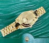 NEW! All original, Rolex Day-Date President 40mm – 18K Yellow Gold with Black Dial & Baguette Diamon