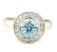14kt White gold blue topaz and diamond ring