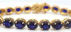 Captivating 19.30CTW Oval Faceted Blue Sapphire & 1.40CTW Diamond Bracelet in 14K Yellow Gold Over S