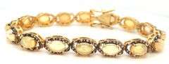 Fabulous 12.10CTW Oval Faceted Opal W/ Fire & Diamond Bracelet in 14K Yellow Gold Over Sterling Silv
