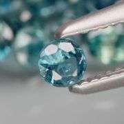 Heated only! 3.09ct blue green Sapphire set