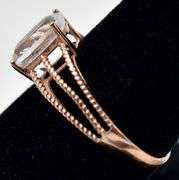Beautiful 9K Rose Gold Clear Gemstone Ring