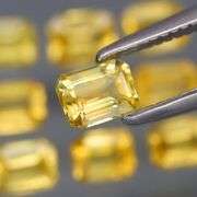 Incredible 2.25ct emerald cut yellow Sapphire set -Heated only!