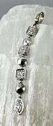Feminine 18K White Gold Dangling Diamond Pendant