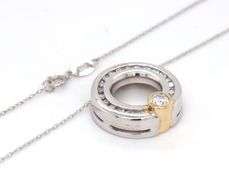 14kt White gold approximate 0.20ctw 2 tone circle diamond pendant on chain