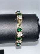 18 Kt White Gold Plated Huge 32.5 Ctw Lab Simulated Diamond and Green Emerald Tennis Bracelet