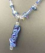 Blue and white crystal rhinestone pendant on beaded necklace