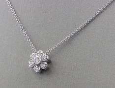 114kt White gold diamond flower style pendant on chain