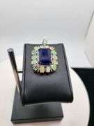 Exquisite 36ct Tanzanite with 1.21ct Natural Diamonds & 14 Rare Opals in silver pendent