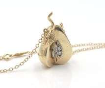 14kt Yellow gold diamond pear fruit pendant on chain