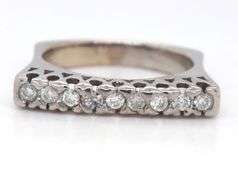 14kt White gold 0.20ctw diamond flat band