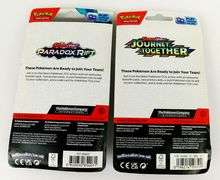 2 Pokémon 2023 Booster Packs with Coins, Sealed