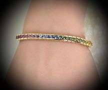 Stunning 14K Yellow Gold Straight Line Rainbow Bracelet