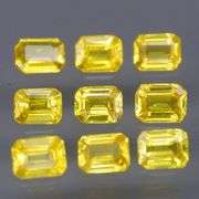 Incredible 2.04ct emerald cut yellow Sapphire set -Heated only!