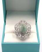 Exquisite 7.75CTS Oval Shaped Cabochon-Cut Emerald & 2.35CTW White Sapphire Ring in Sterling Silver