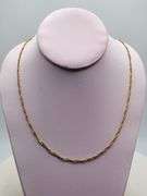 24" 18k chain with extra link , Extra link can be used as ring with size of 5.5 inch