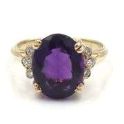 14kt Yellow gold oval amethyst and diamond ring