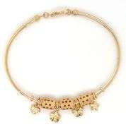 18kt Yellow gold charm bangle bracelet