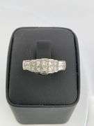 CERTIFIED PLATINUM AND DIAMOND RING.