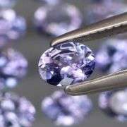 Heavy flashing! Untreated! 2.02ct oval cut Tanzanite set
