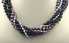 Multi strand black onyx and pearl necklace
