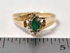 Beautiful 10K Yellow Gold Emerald Gemstone and Diamond Ring