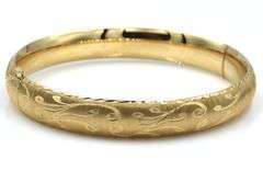 Pretty Patterned 14k yellow gold Opening Bangle