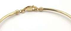 18kt Yellow gold charm bangle bracelet