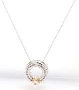 14kt White gold approximate 0.20ctw 2 tone circle diamond pendant on chain