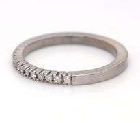 18kt White gold 0.15ctw 4 prong diamond band