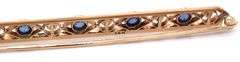 Antique Enamel, blue sapphire and pearl brooch in 14kt yellow gold