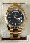 NEW! All original, Rolex Day-Date President 40mm – 18K Yellow Gold with Black Dial & Baguette Diamon