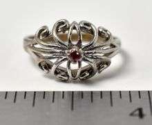 Cute Ornate Ring with Pink Gemstone in Sterling Silver