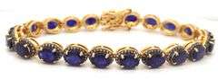 Captivating 19.30CTW Oval Faceted Blue Sapphire & 1.40CTW Diamond Bracelet in 14K Yellow Gold Over S