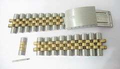 CONTENT OF SAFE DEPOSIT BOX: 18K AND STAINLESS ROLEX BAND