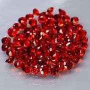 Outstanding 6.16ct diamond cut high fire Mozambique Garnet set