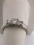 CERTIFIED LADIES PLATINUM AND DIAMOND RING