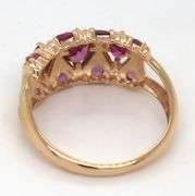 14kt Yellow gold oval and round rhodalite garnet dome ring