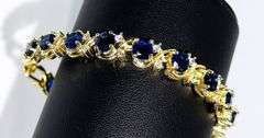 18 K White Gold Plated Huge 12.5 Ctw Lab Simulated Diamond and Blue Sapphire Tennis Bracelet