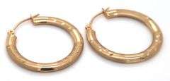 14kt Yellow gold diamond cut hoop earrings