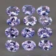 Heavy flashing 2.22ct oval cut Tanzanite set
