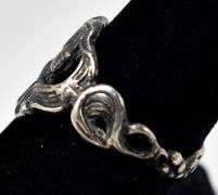 Girl Profile with Flower Detailing in Sterling Silver