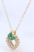 14kt Yellow Gold Emerald and Diamond Heart Shaped Pendant on Chain