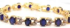 Enchanting 21.00CTW Oval Faceted Blue Sapphire & 2.00CTW Diamond Bracelet in 14K White & Yellow Gold