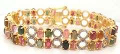 Heart Throbbing 18.00CTW Oval Shaped Faceted Multi-colored tourmaline & 3.00CTW  Diamond Bracelet in